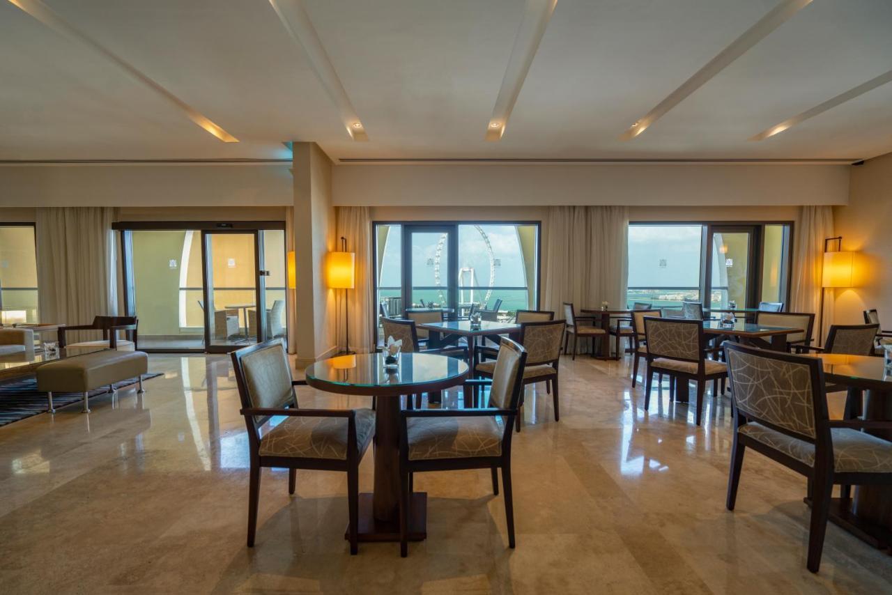 Amwaj Rotana, Jumeirah Beach - Dubai Esterno foto The lounge at the airport