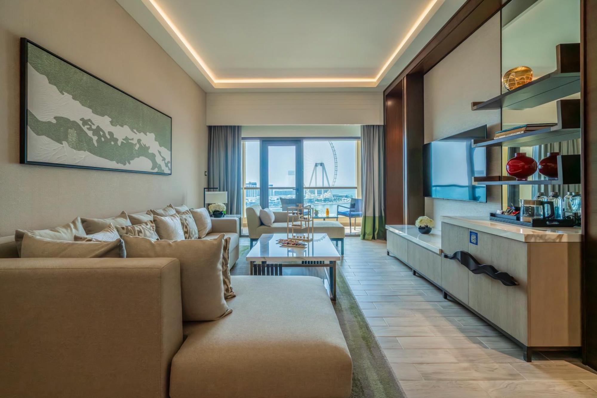 Amwaj Rotana, Jumeirah Beach - Dubai Camera foto A living room at the Ritz-Carlton, DIFC